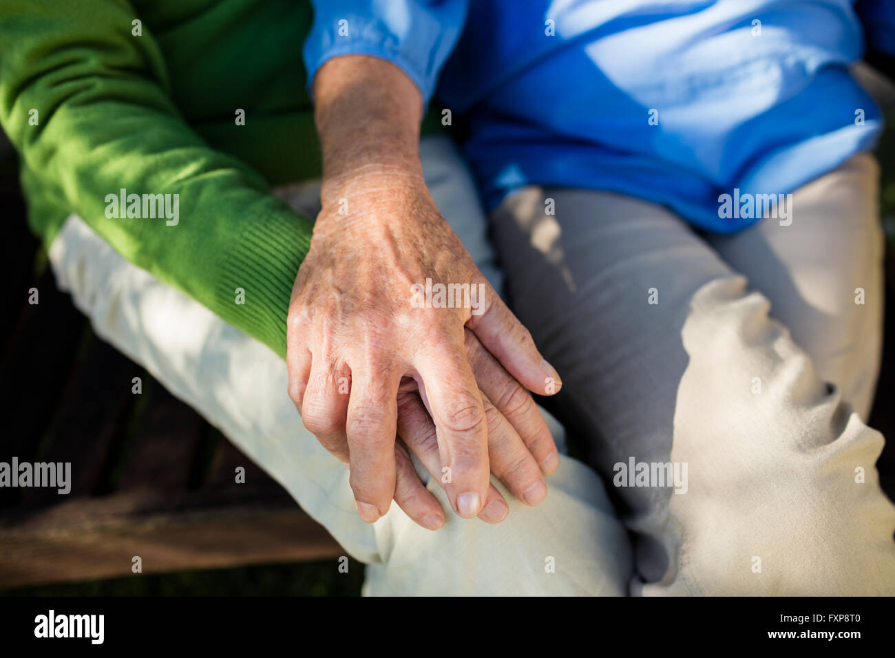 Focus on senior couples hands Stock Photo