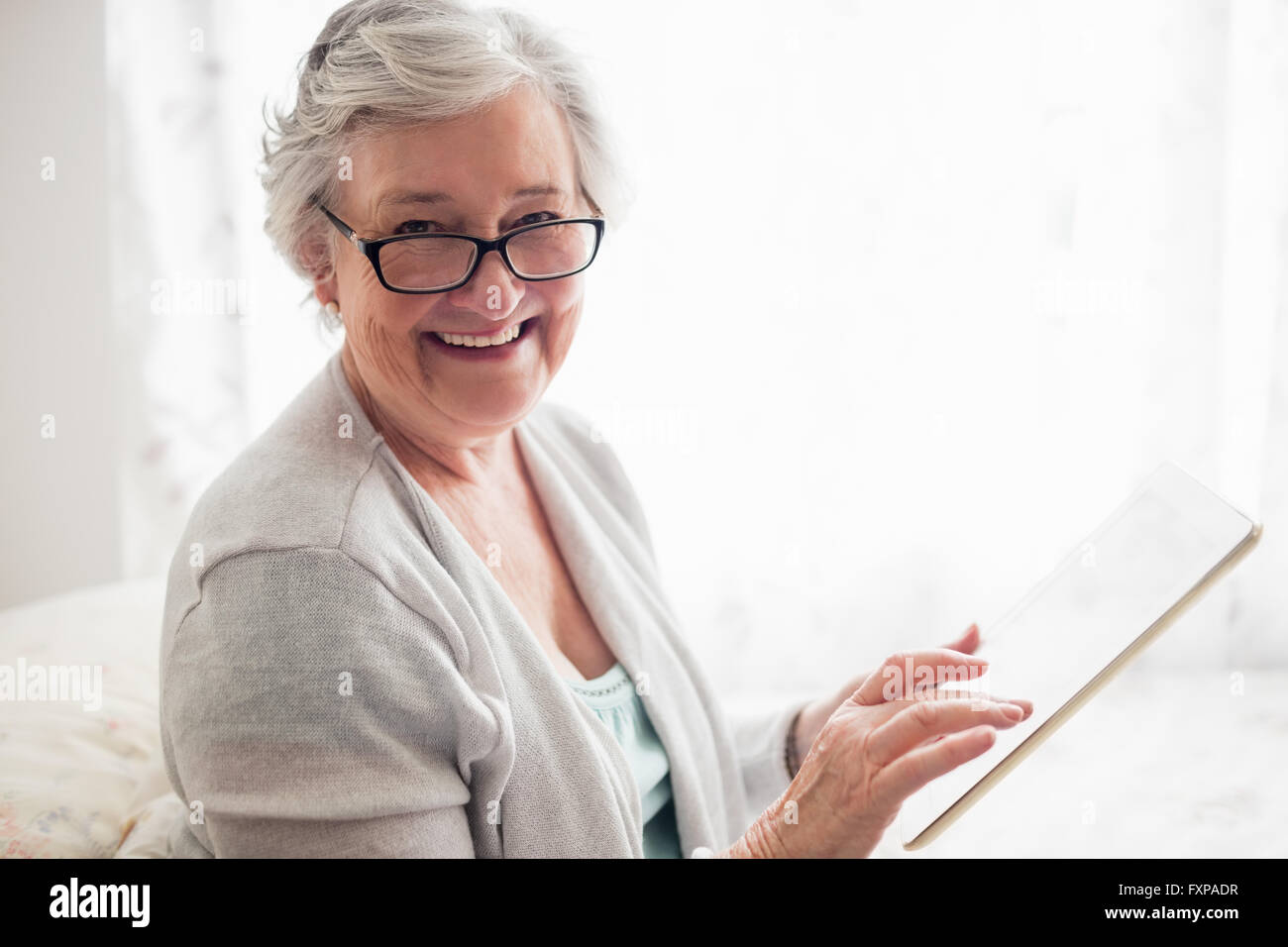 Smiling caucasian female senior hi-res stock photography and images - Alamy