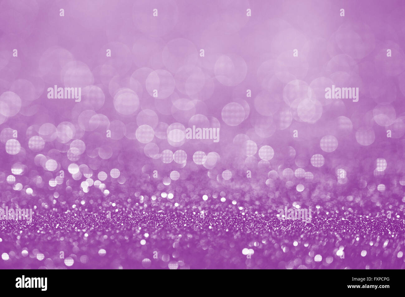Purple glitter surface with purple light bokeh - It can be used for  background for special occasions promotion campaign or produ Stock Photo -  Alamy