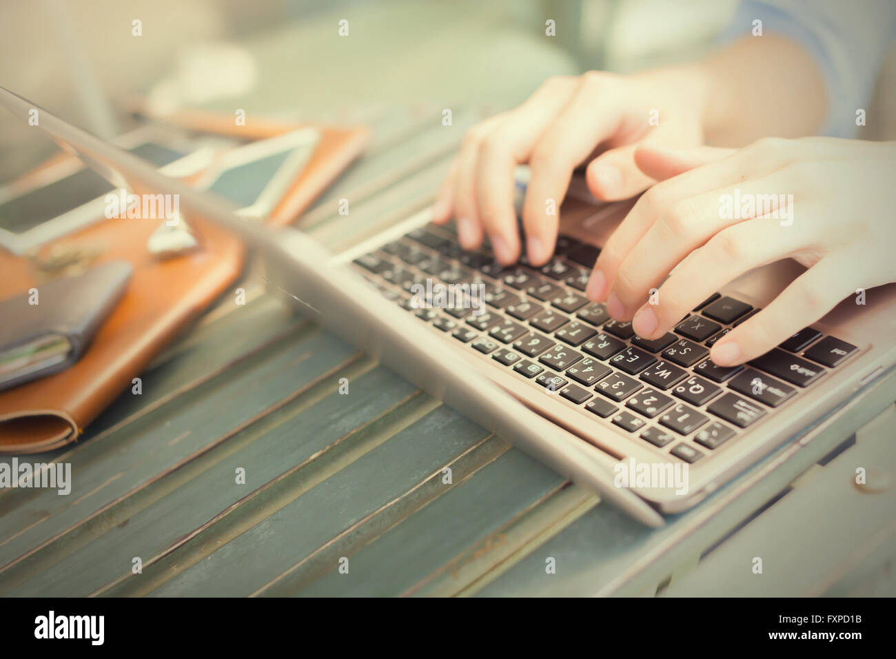 Hands typing on laptop smart hi-res stock photography and images - Alamy