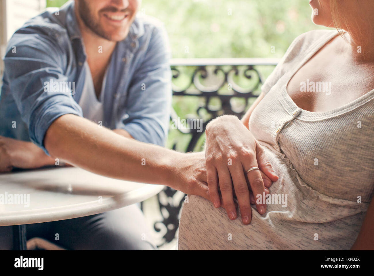 Parents excited about new addition to family Stock Photo Alamy