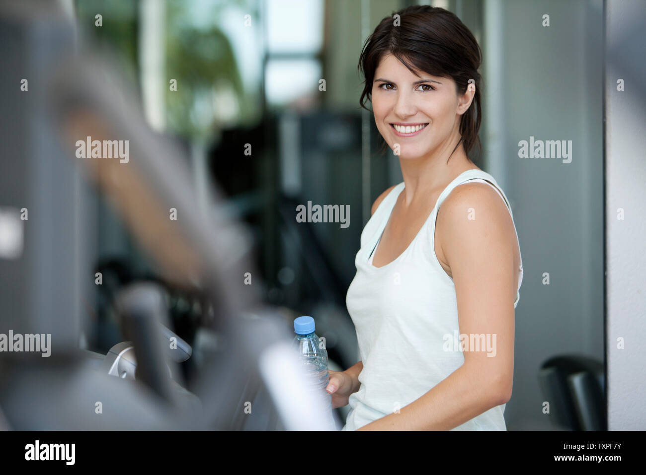 Woman smiling in fitness club, portrait Stock Photo - Alamy