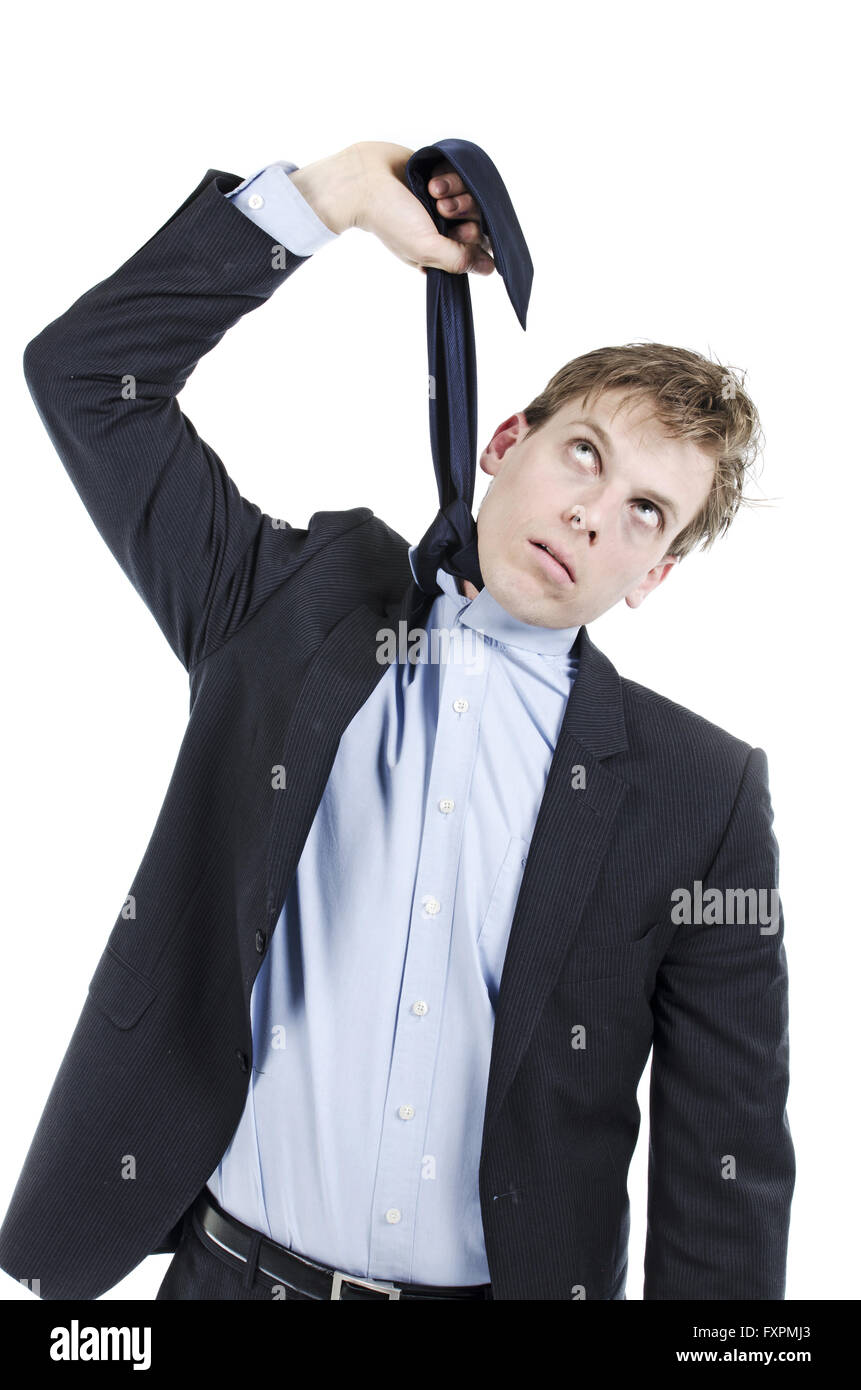Businessman hanging himself with his tie Stock Photo