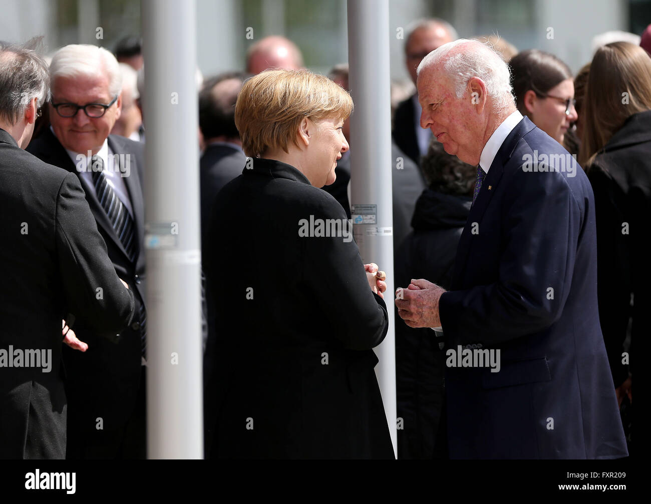 Bonn, Germany. 17th Apr, 2016. German Chancellor Angela Merkel (C) talks to former US Secretary of State James Baker (R), with German foreign minister Frank-Walter Steinmeier (2-L) pictured behind them, following an Act of State held for former German foreign minister Hans-Dietrich Genscher in the former plenary hall of the German Bundestag parliament in Bonn, Germany, 17 April 2016. Photo: OLIVER BERG/dpa/Alamy Live News Stock Photo