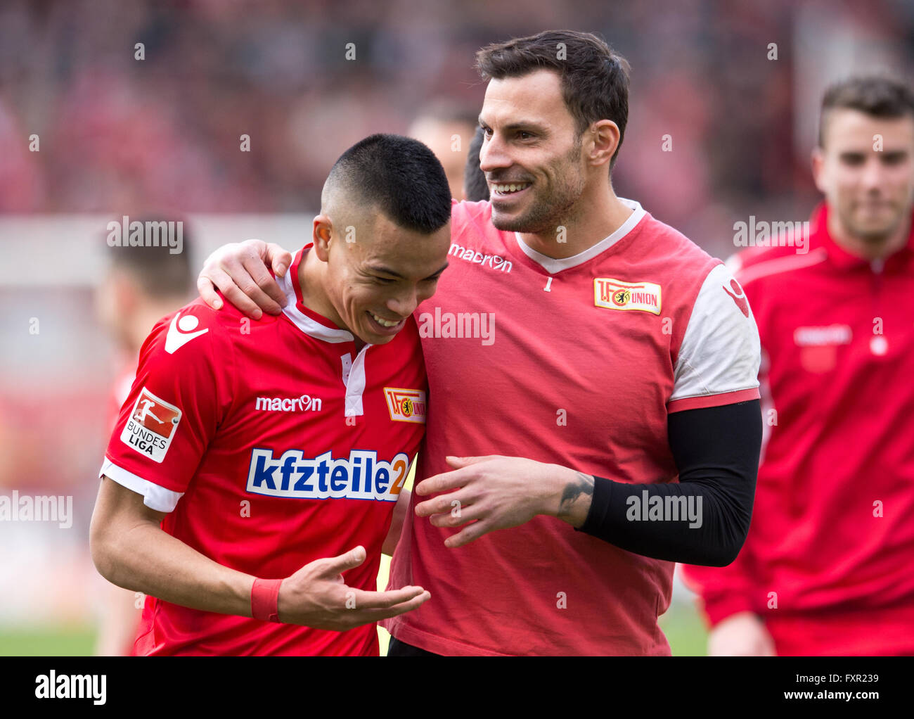 Berlin, Germany. 17th Apr, 2016. Berlin's goalkeeper Daniel Haas (2-R) embraces teammate and goalscorer Bobby Wood (L) after the German second division Bundesliga soccer match between FC Union Berlin and FC Heidenheim in Berlin, Germany, 17 April 2016. Photo: ANNEGRET HILSE/dpa/Alamy Live News Stock Photo