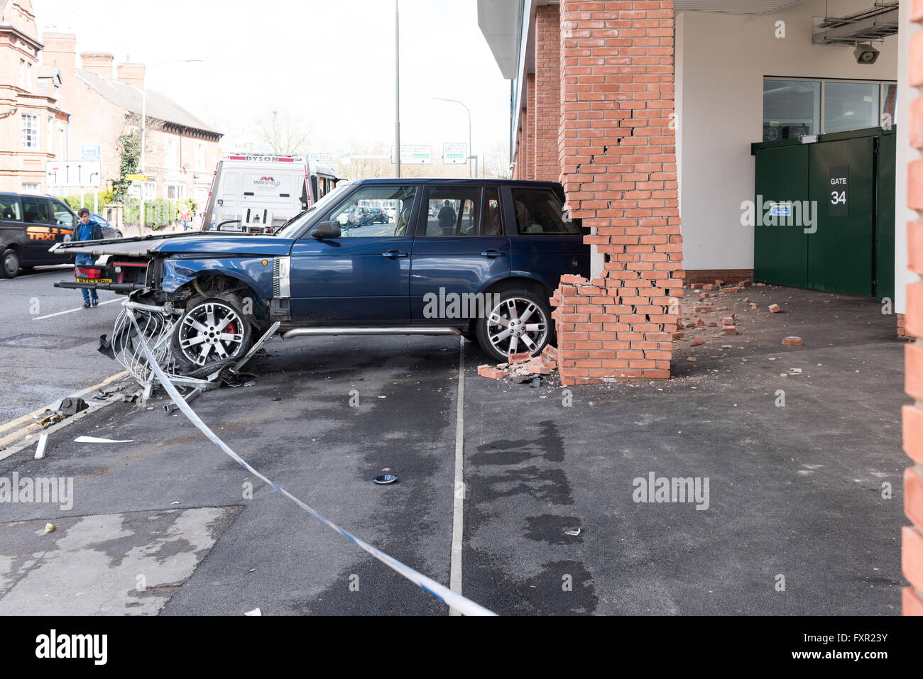 Leicester, UK. 17th April, 2016. A driver lost control of his Range rover a 4x4 this morning along Welford road and crashes into the rugby football stadium for Leicester Tigers . There was no reports of any injuries,There was however substantial damage to one of the brick pillars supporting the main stand. Credit:  Ian Francis/Alamy Live News Stock Photo