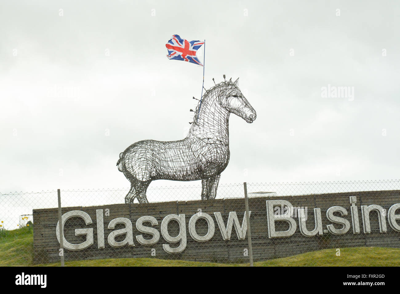 Glasgow, Scotland, UK - 17 April 2016: Union Jack flag attached to the Heavy Horse sculpture by the side of the M8 motorway on the day of the Rangers v Celtic semi final in the Scottish Cup Credit:  Kay Roxby/Alamy Live News Stock Photo