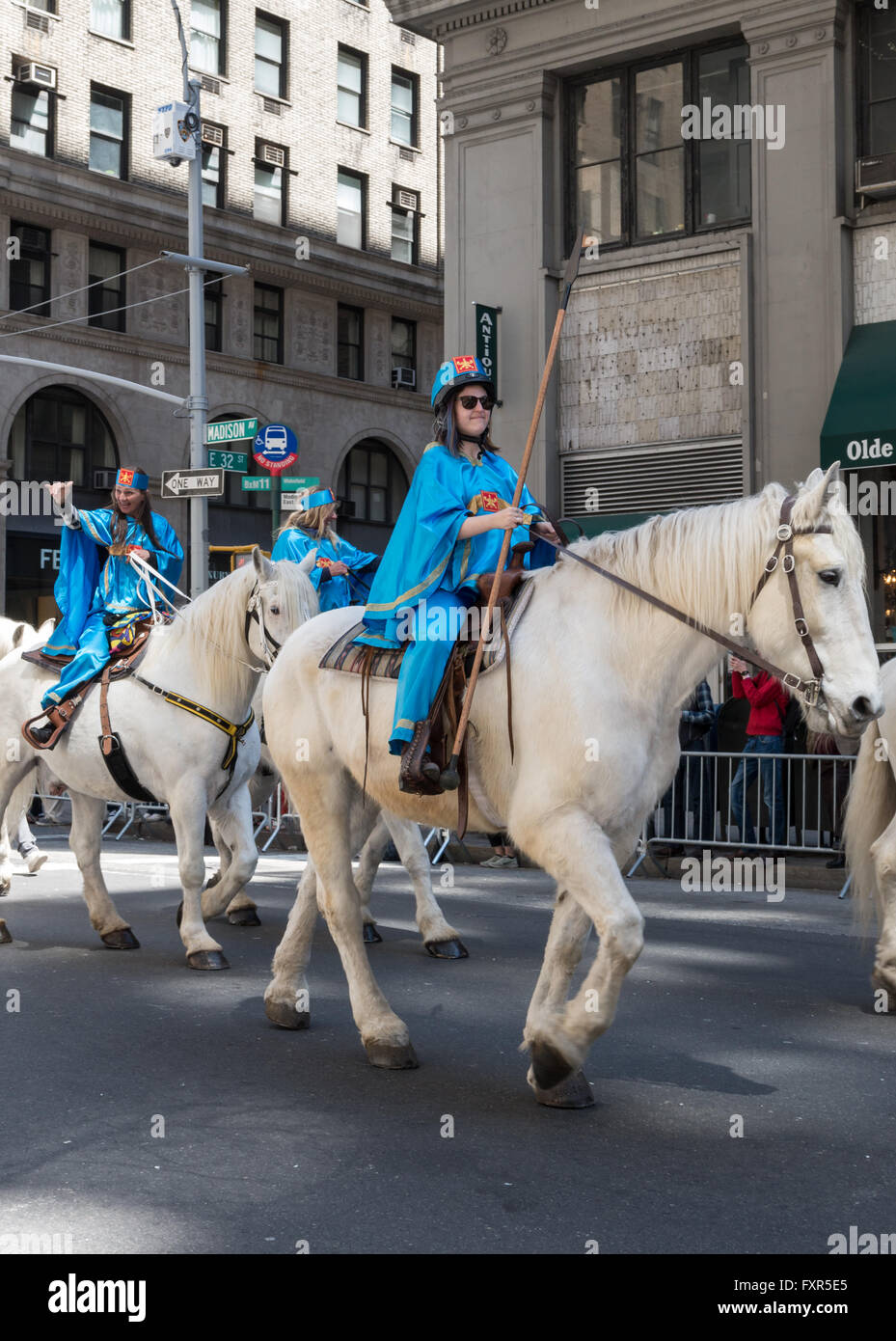Women in traditional Iranian / Persian costume ride white horses in the 2016 Persian Parade, New York Stock Photo