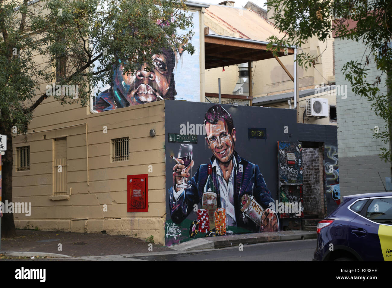 Sydney, Australia. 18 April 2016. Artist Scott Marsh, renowned for his Kanye Loves Kanye mural has made another mural, this time of NSW Premier, Mike Baird in a statement about Sydney's lockout laws. The Premier is depicted holding a kebab and glass of wine surrounded by poker chips. The mural can be seen on Chippen Lane in Chippendale, Sydney, just a short walk from the previous mural on Teggs Lane, which has now been painted over. Credit: Richard Milnes/Alamy Live News Stock Photo