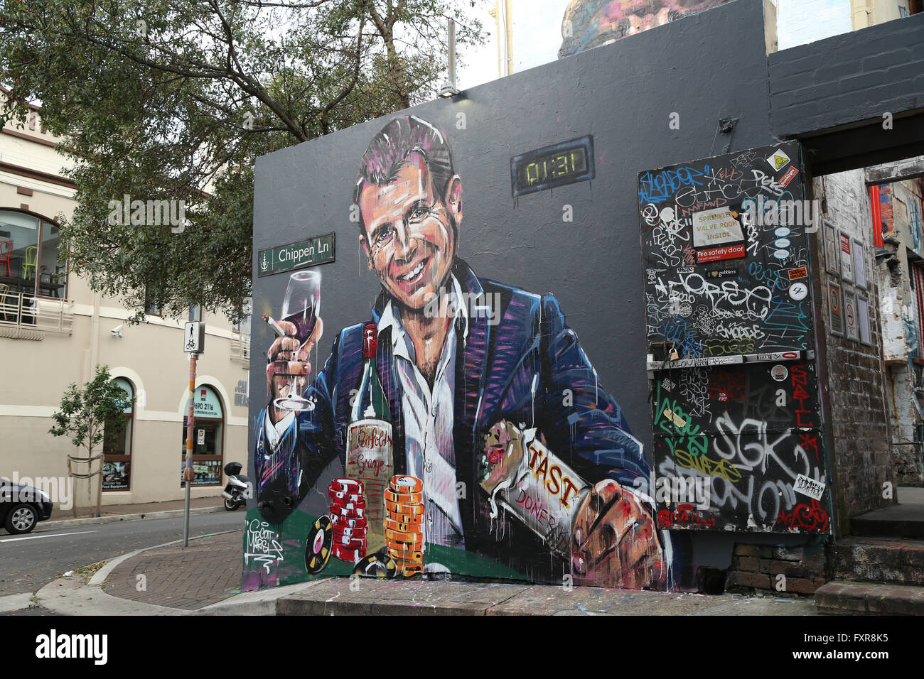 Sydney, Australia. 18 April 2016. Artist Scott Marsh, renowned for his Kanye Loves Kanye mural has made another mural, this time of NSW Premier, Mike Baird in a statement about Sydney's lockout laws. The Premier is depicted holding a kebab and glass of wine surrounded by poker chips. The mural can be seen on Chippen Lane in Chippendale, Sydney, just a short walk from the previous mural on Teggs Lane, which has now been painted over. Credit: Richard Milnes/Alamy Live News Stock Photo
