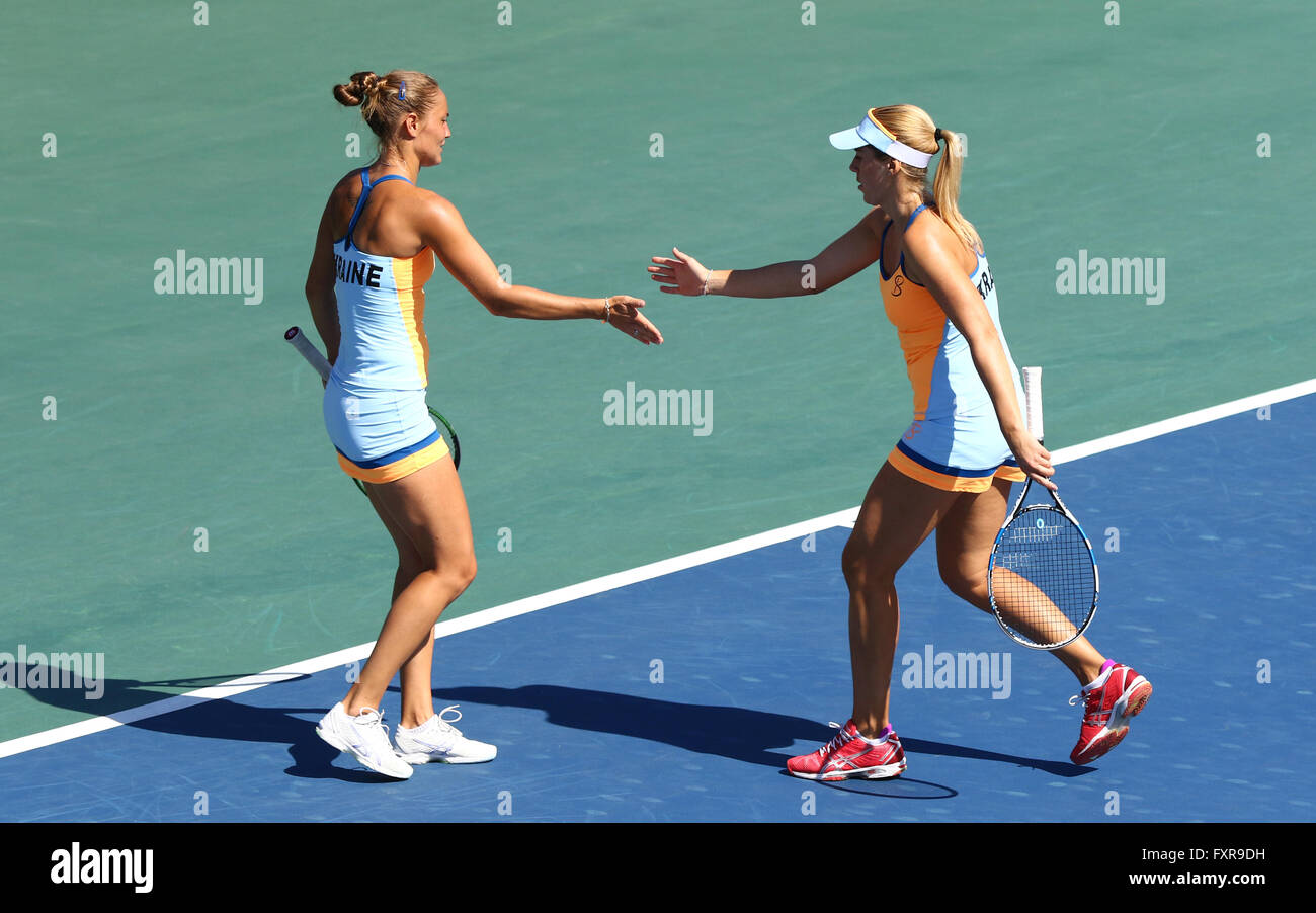 Kyiv, Ukraine. 17th April, 2016. Kateryna Bondarenko (L) and Olga Savchuk of Ukraine react during BNP Paribas FedCup match against Maria Irigoyen of Argentina at Campa Bucha Tennis Club in Kyiv, Ukraine. Credit:  Oleksandr Prykhodko/Alamy Live News Stock Photo