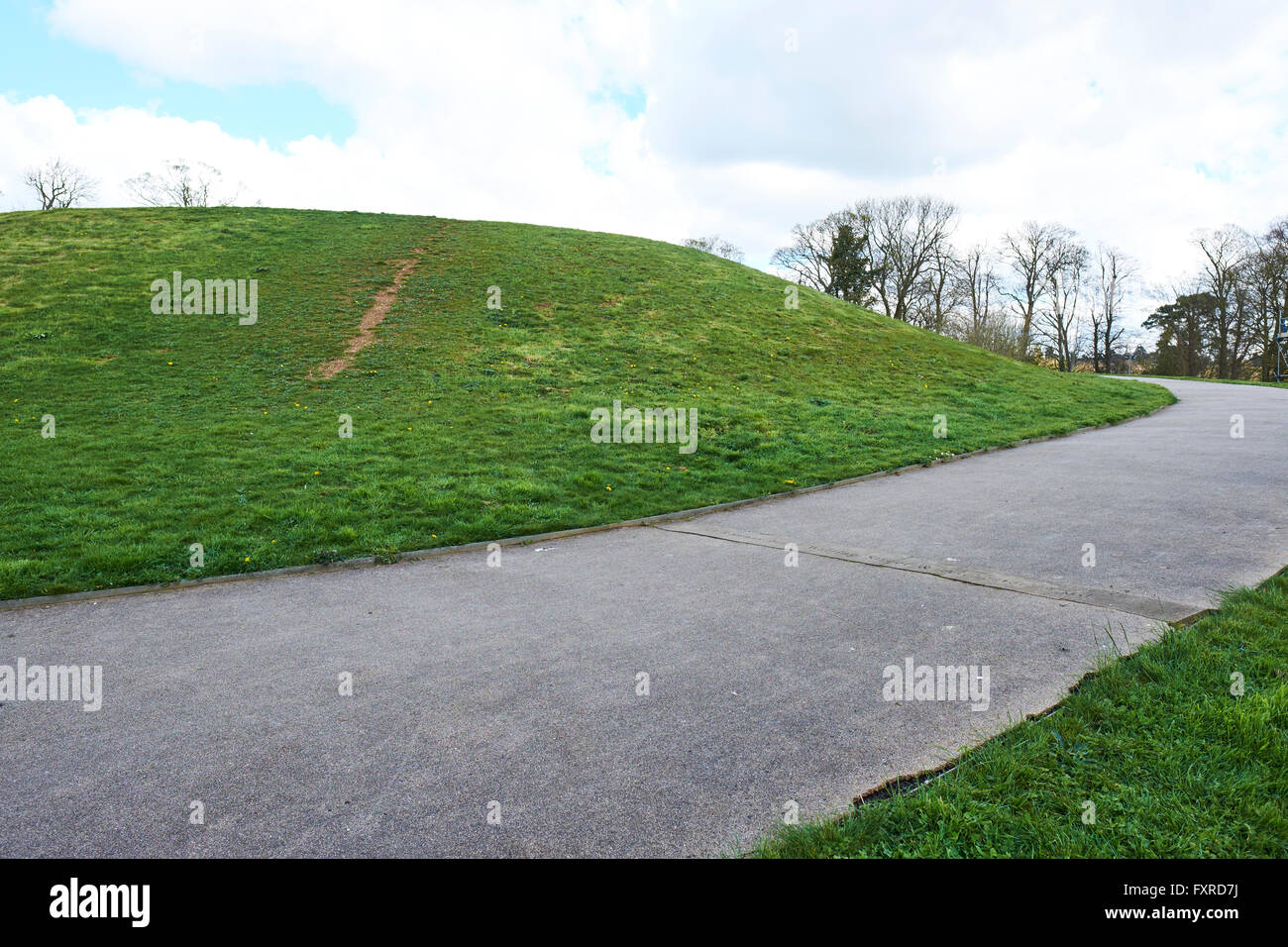 Bury Mount Originally A Motte And Bailey Motte Castle Engraved Along The Footpath Is A Timeline Of Key Dates Towcester UK Stock Photo
