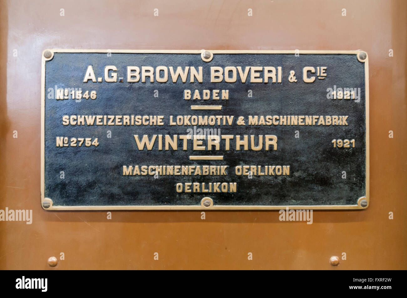 Locomotive builder sign listing Brown Boveri & Co., Schweizerische Lokomotiv- und Maschinenfabrik, and Maschinenfabrik Oerlikon. Stock Photo
