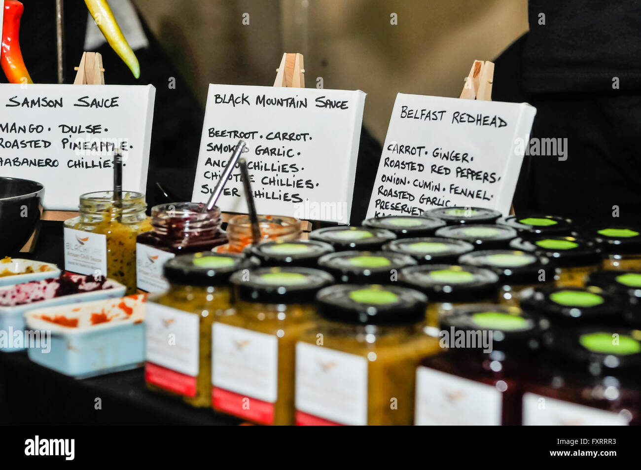 Home made chili sauces from Belfast on sale at a market stall Stock