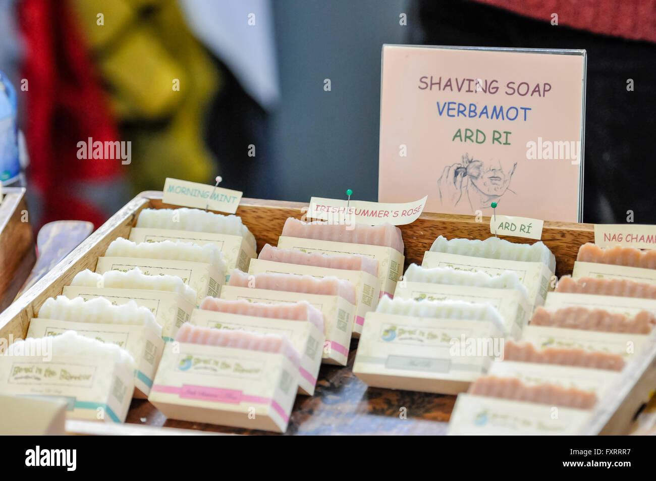 Handmade shaving soap bars on sale at a market stall. Stock Photo