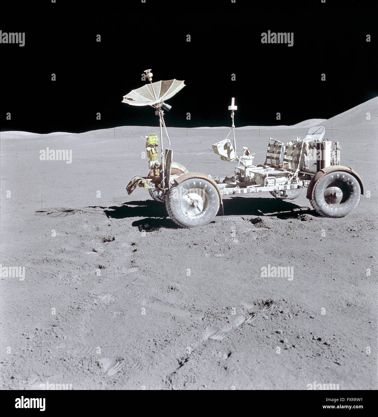 NASA Lunar Roving Vehicle is photographed alone against the lunar background during the Apollo 15 lunar surface extravehicular activity on the lunar surface August 1, 1971 in Hadley-Apennine, Moon. Stock Photo