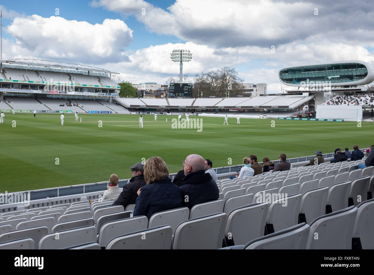 Crowd at county cricket match between Middlesex & Warwickshire at Lord's, April 2016 Stock Photo