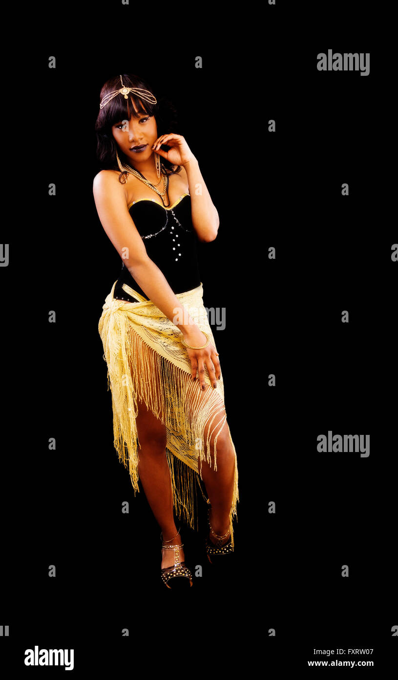 Attractive African American Woman Standing Black And Gold Stock Photo