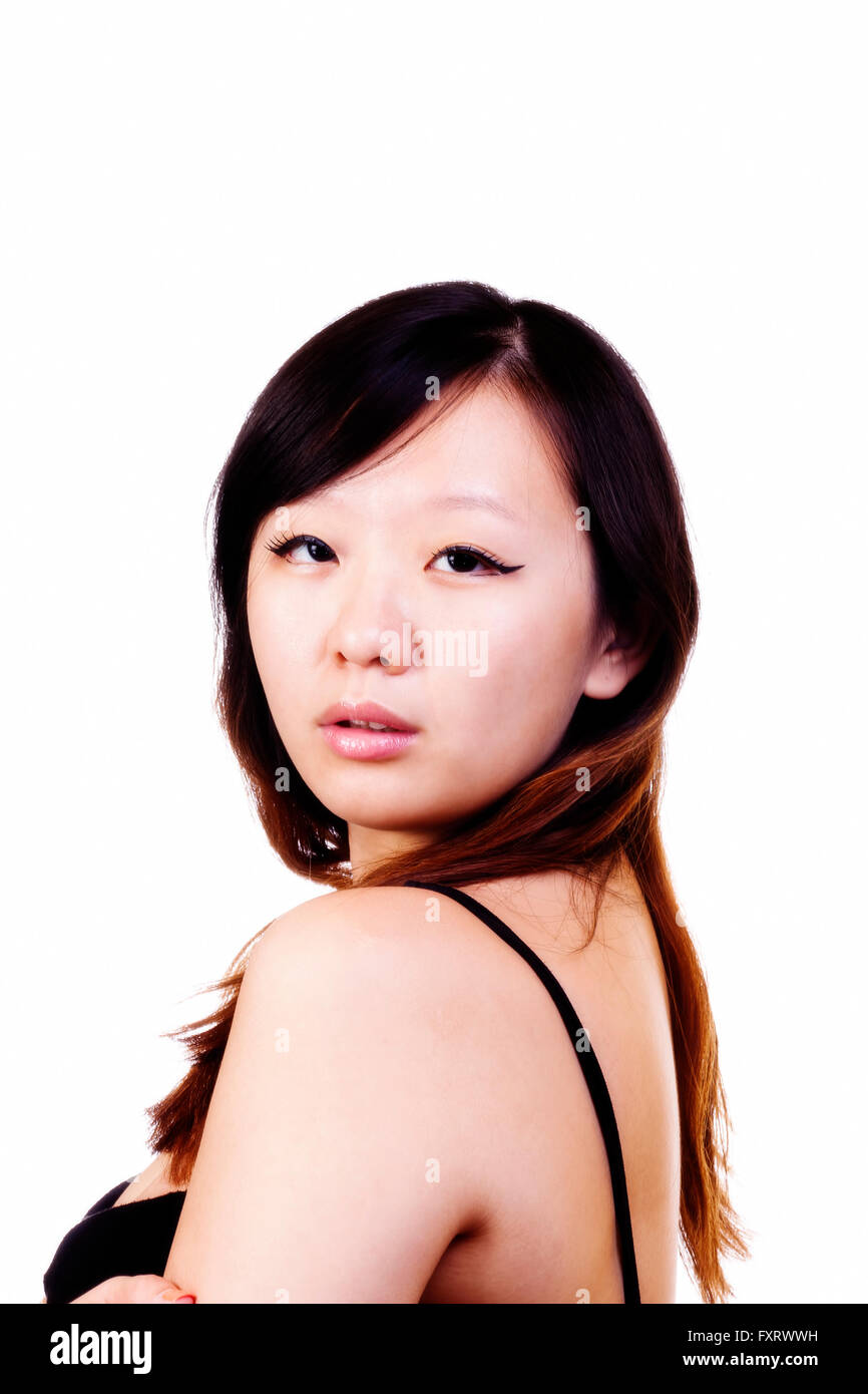 Portrait Of Attractive Chinese Woman Looking Over Shoulder Stock Photo