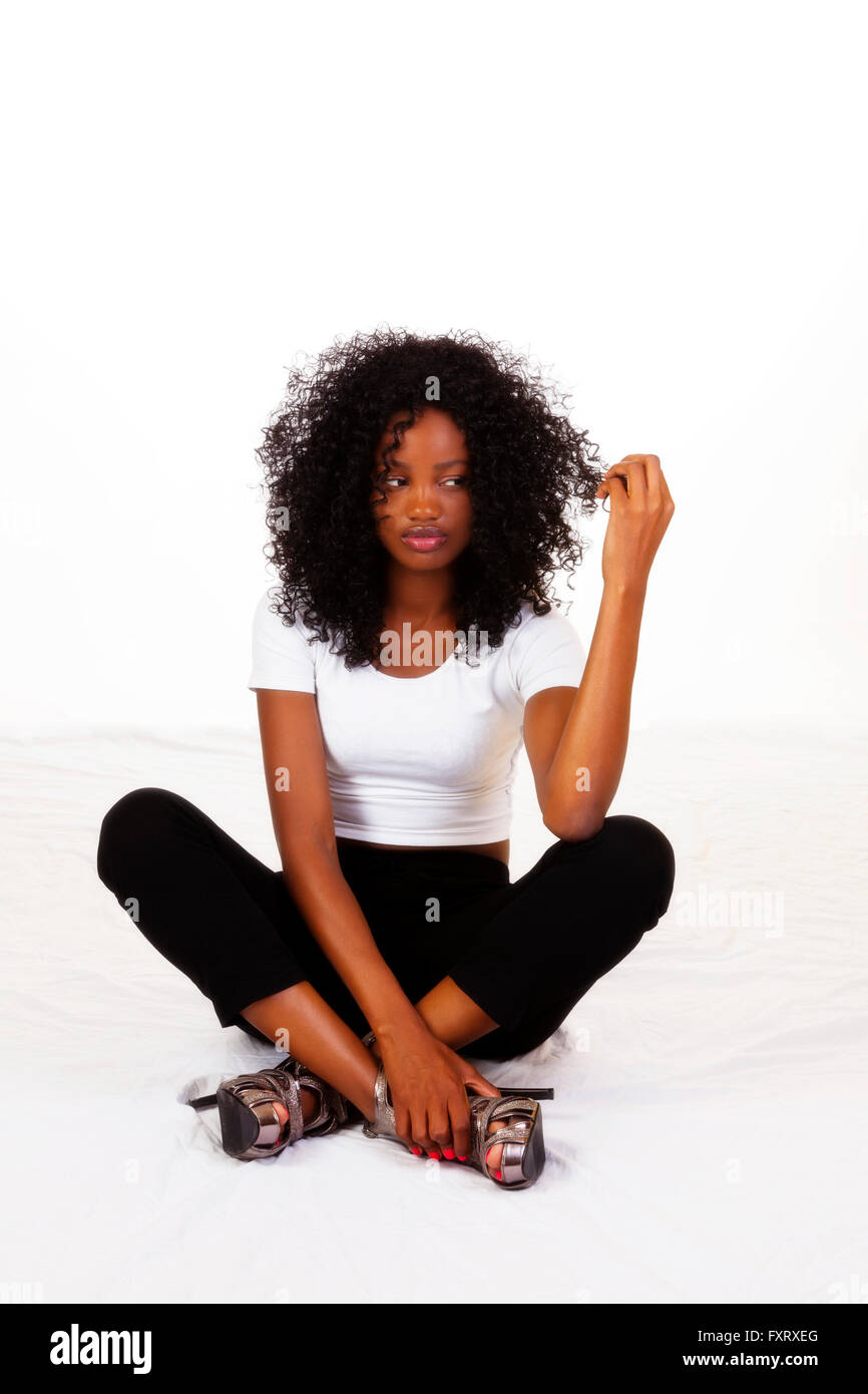 Young Skinny Black Teen Girl Looking At Hair Stock Photo