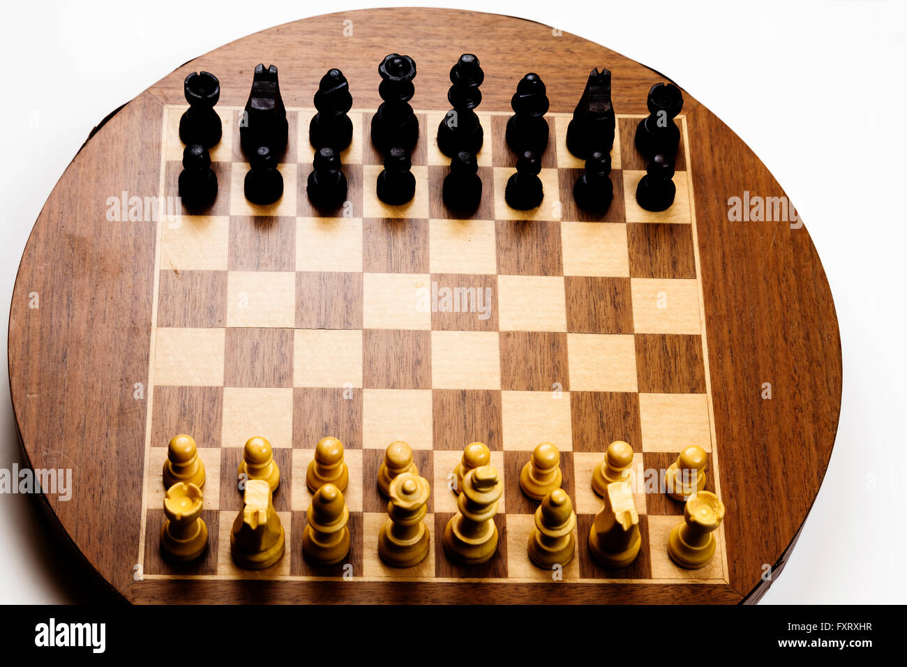 Chess pieces in starting position on a wooden oak Board Stock Photo - Alamy