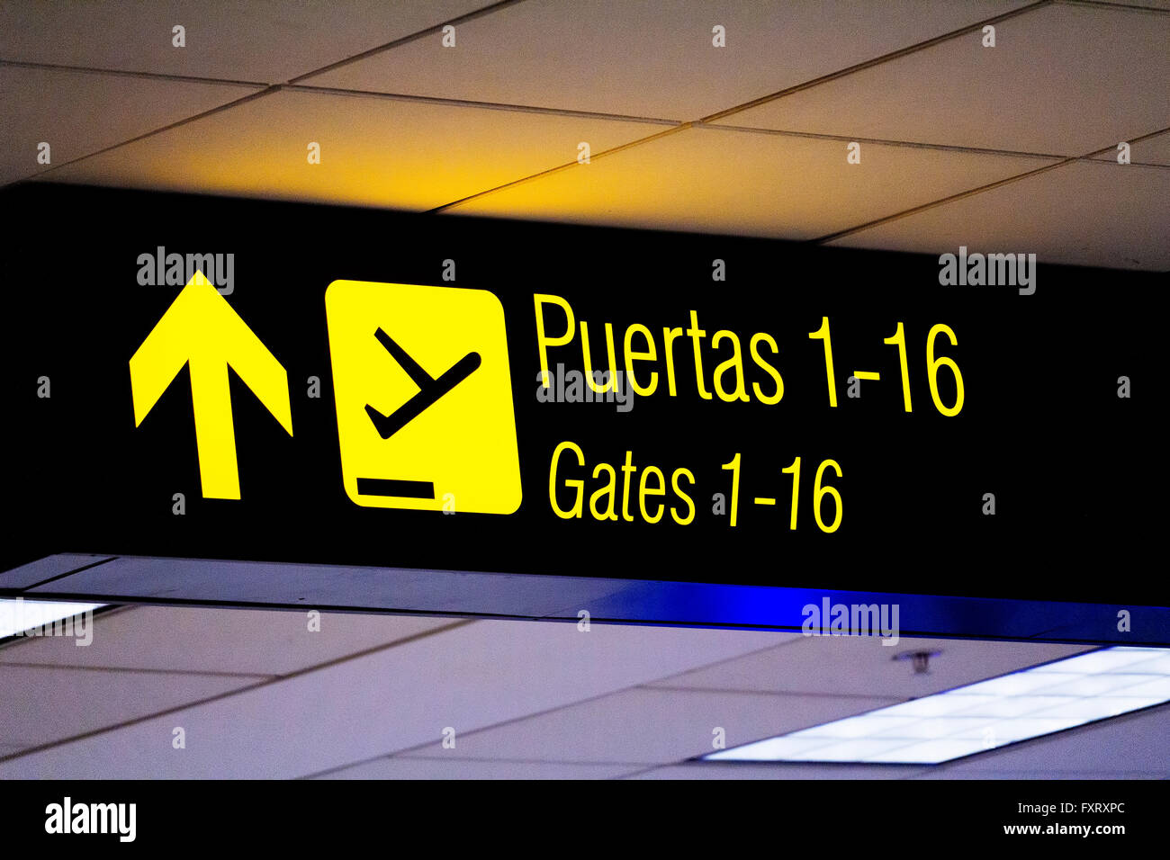 Airport Gates Sign In English And Spanish Peru Stock Photo