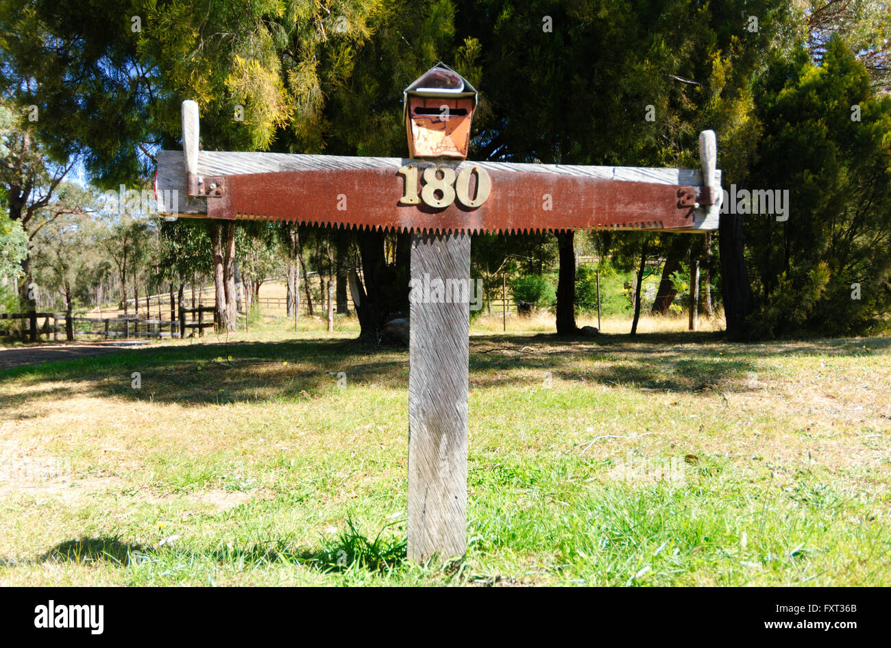 Letterbox in the shape of a wood saw, Australia Stock Photo