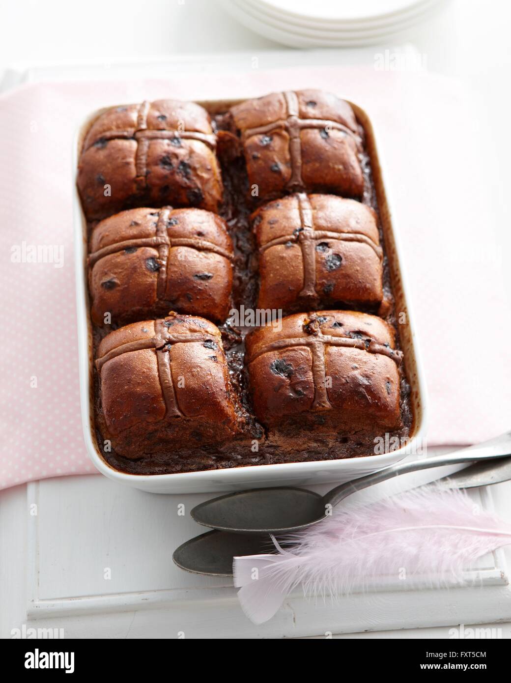Overhead view of hot cross chocolate bread and butter pudding in baking tin Stock Photo