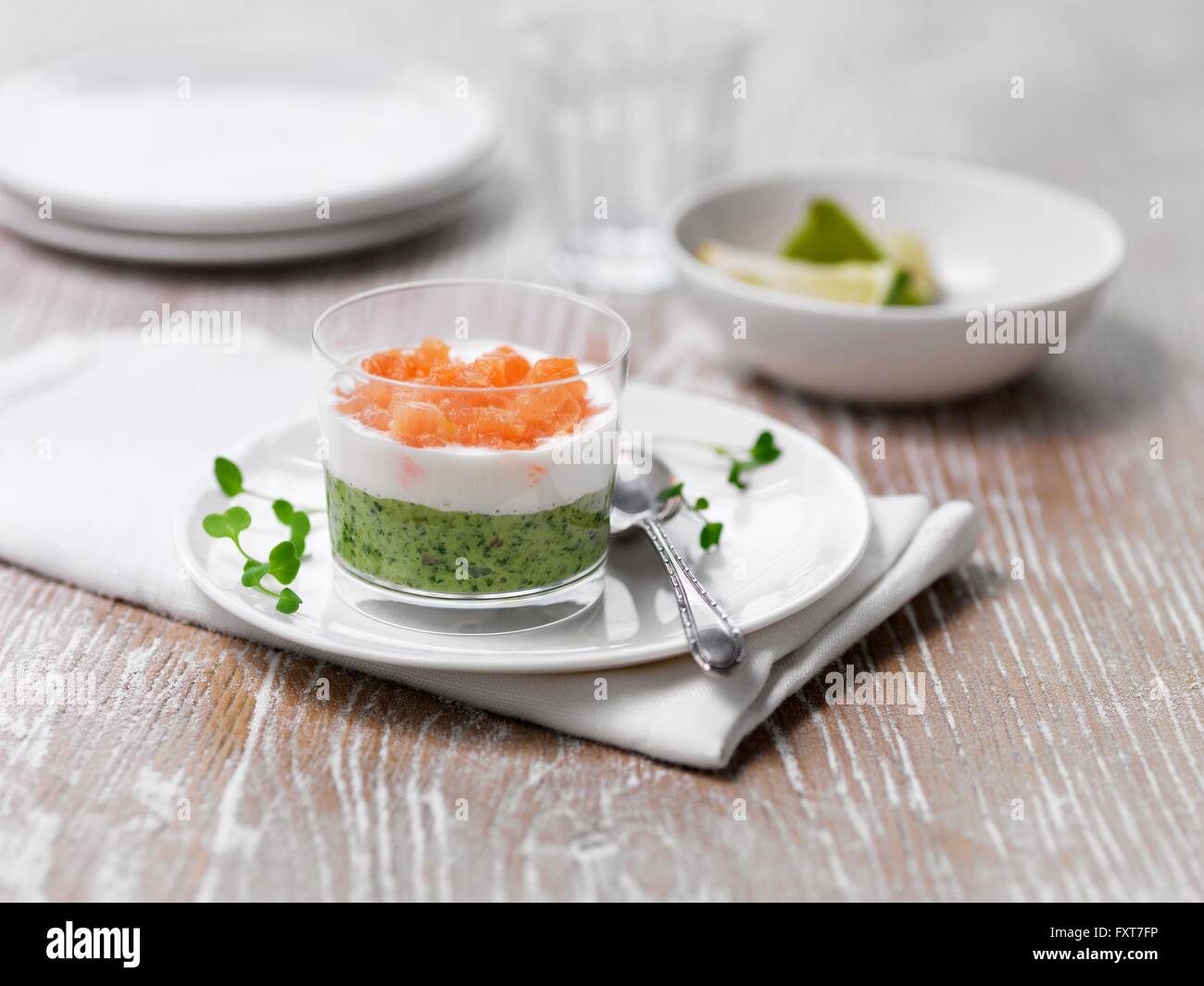 Asian style pea and wasabi salmon starter Stock Photo