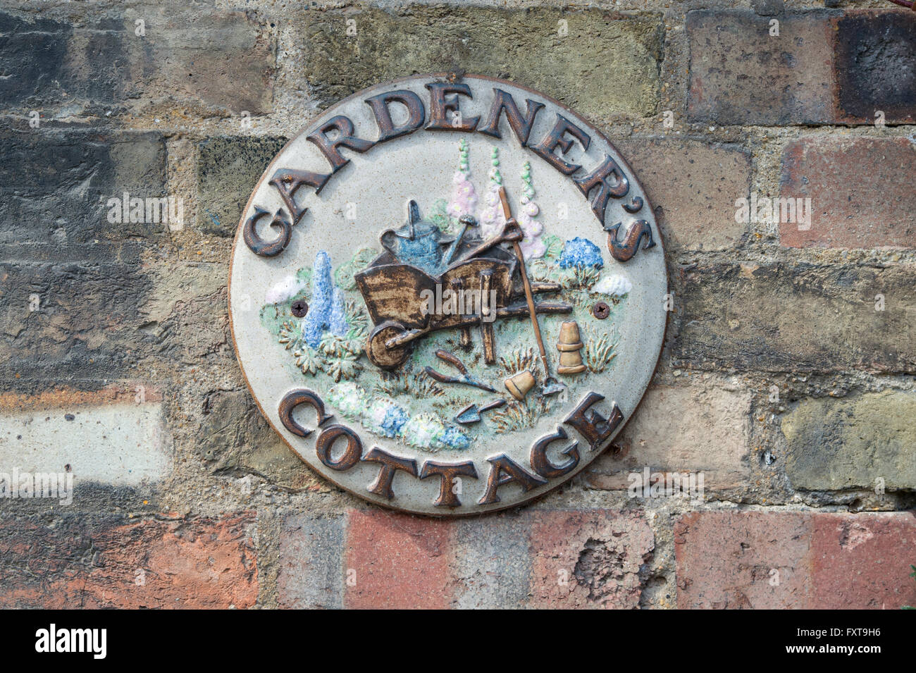 Gardeners Cottage Wall Plaque.  Ely, Cambridgeshire, England Stock Photo