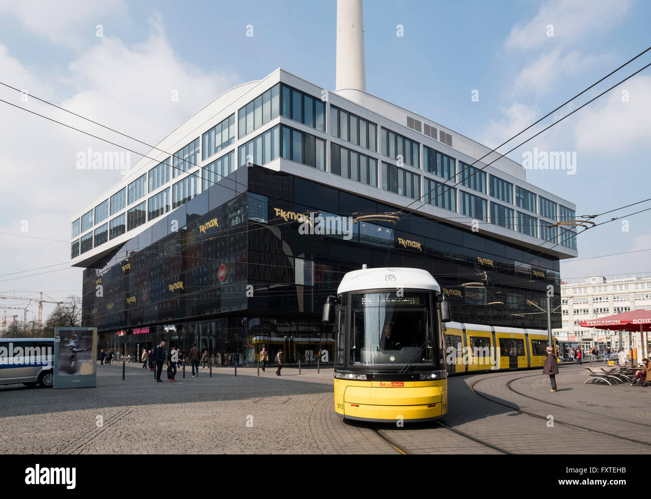 View of new TK Maxx shopping centre and tram in Alexanderplatz in Mitte Berlin Germany Stock Photo