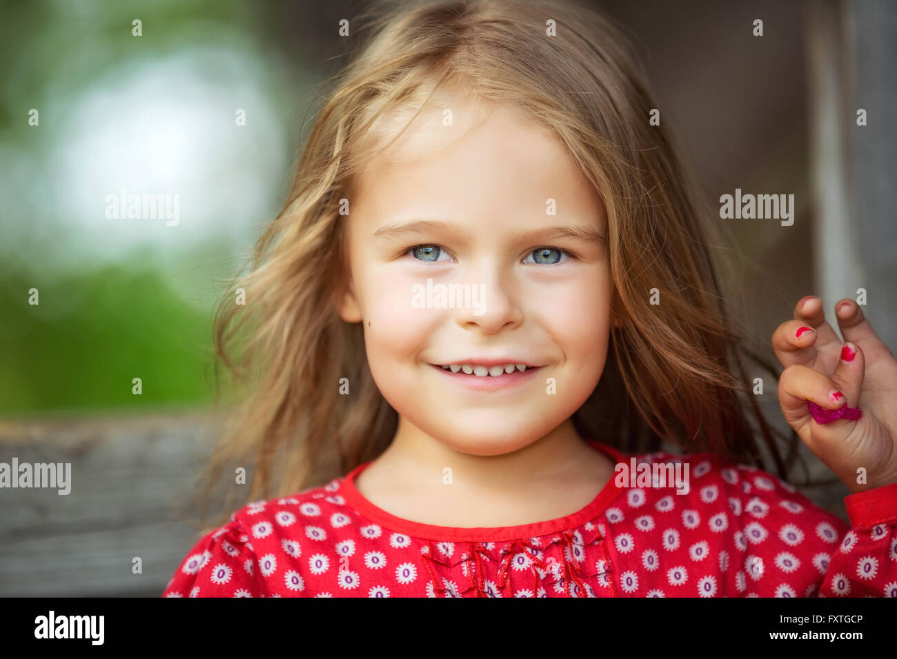Little girl in red dress Stock Photo Alamy