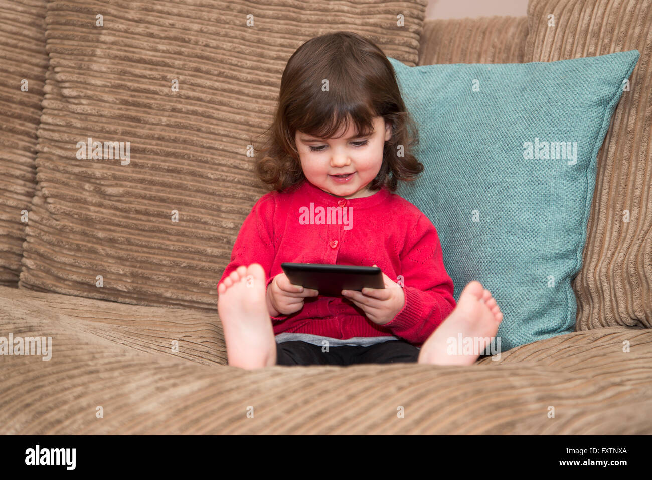 Young girls learning by watching tablet Stock Photo