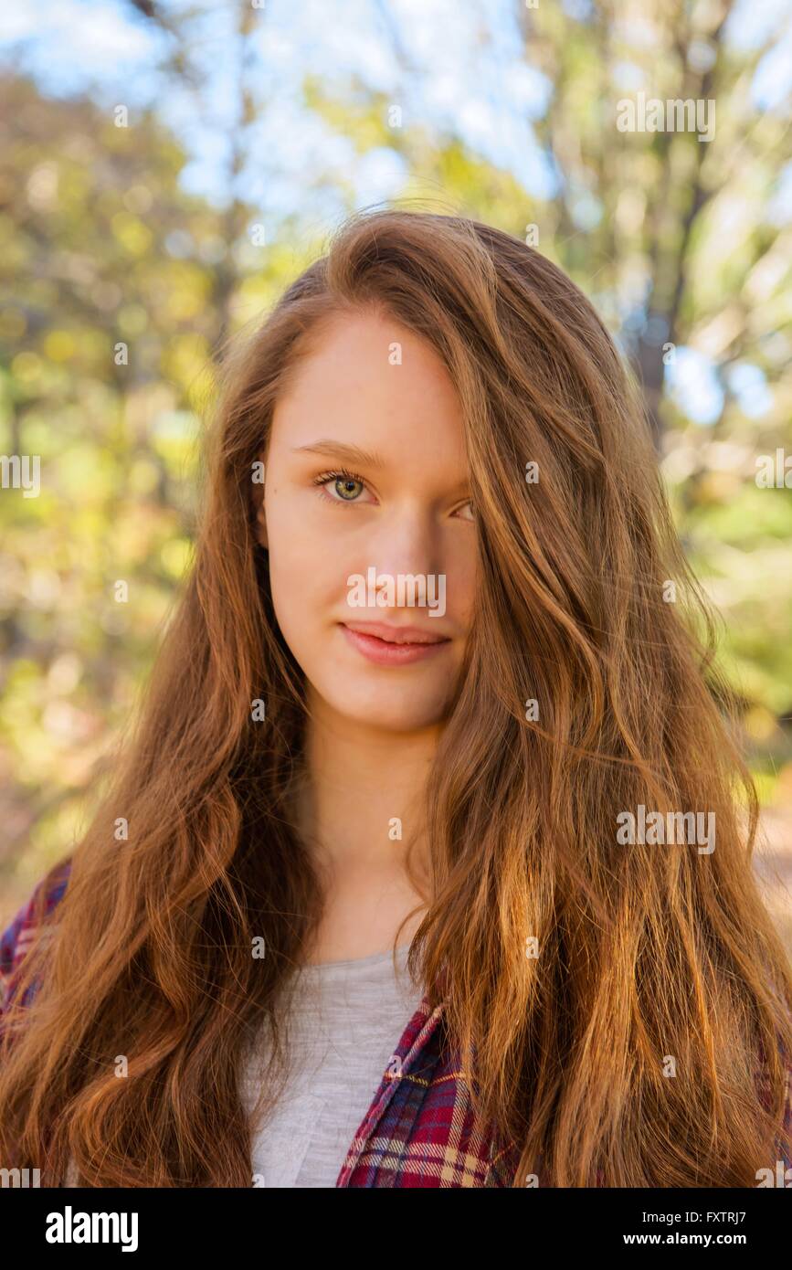 Portrait of teenage girl in forest, close-up Stock Photo
