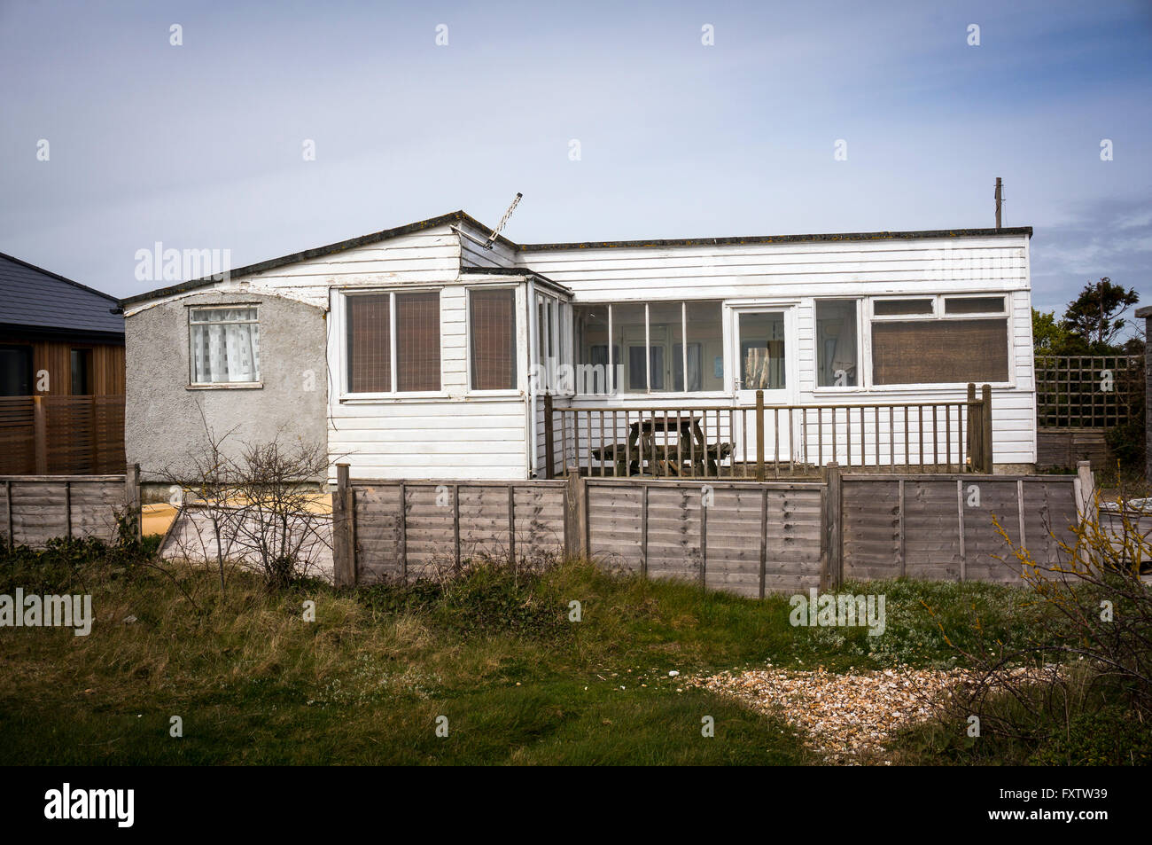 Railway carriage house on Pagham Beach near Chichester, West Sussex, UK