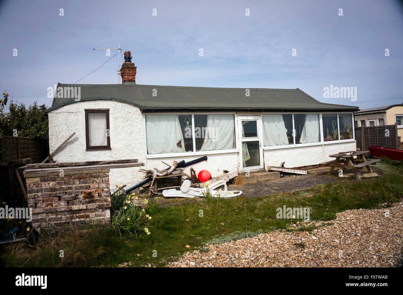 Railway carriage house on Pagham Beach near Chichester, West Sussex, UK