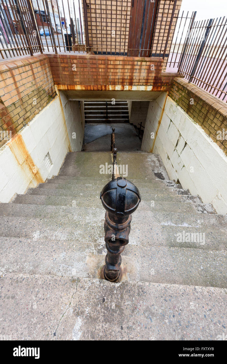 Concrete stairway leading to underpass on the seafront in Blackpool, Lancashire Stock Photo