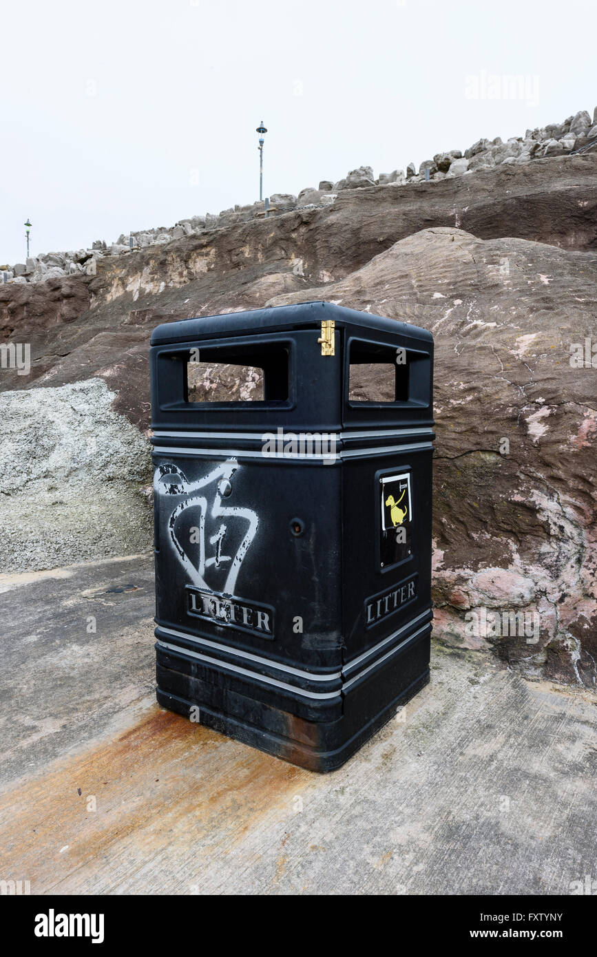 Black litter bin on the promenade of North Shore, Blackpool, Lancashire Stock Photo