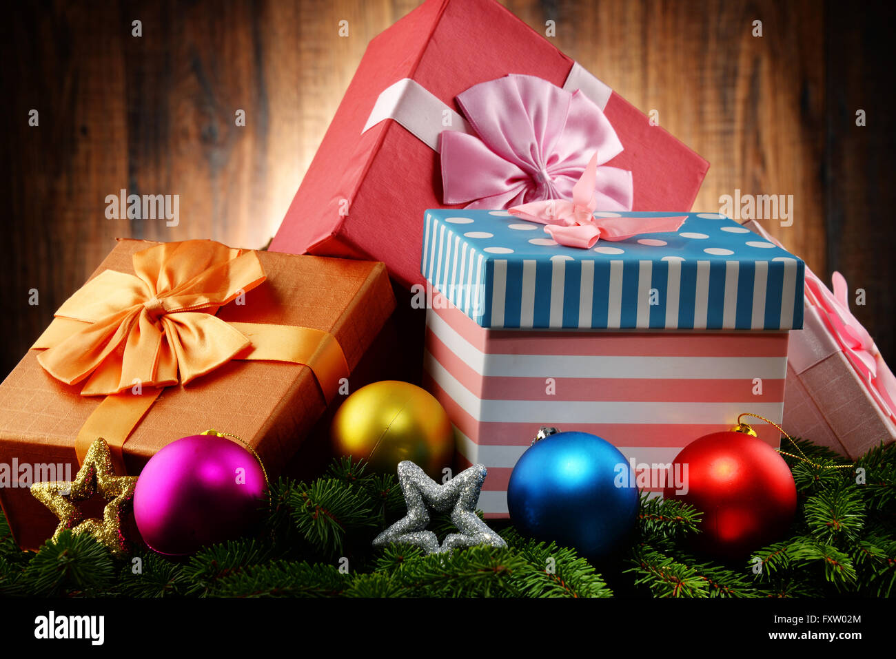 Colorful gift boxes and christmas tree Stock Photo - Alamy