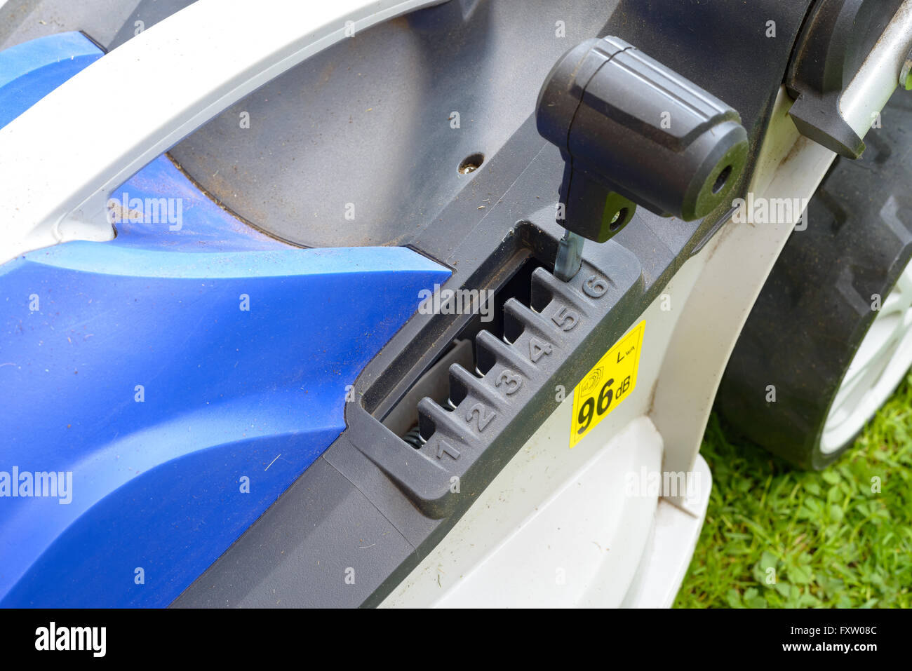 lever to adjust cutting height of the Lawnmower Stock Photo