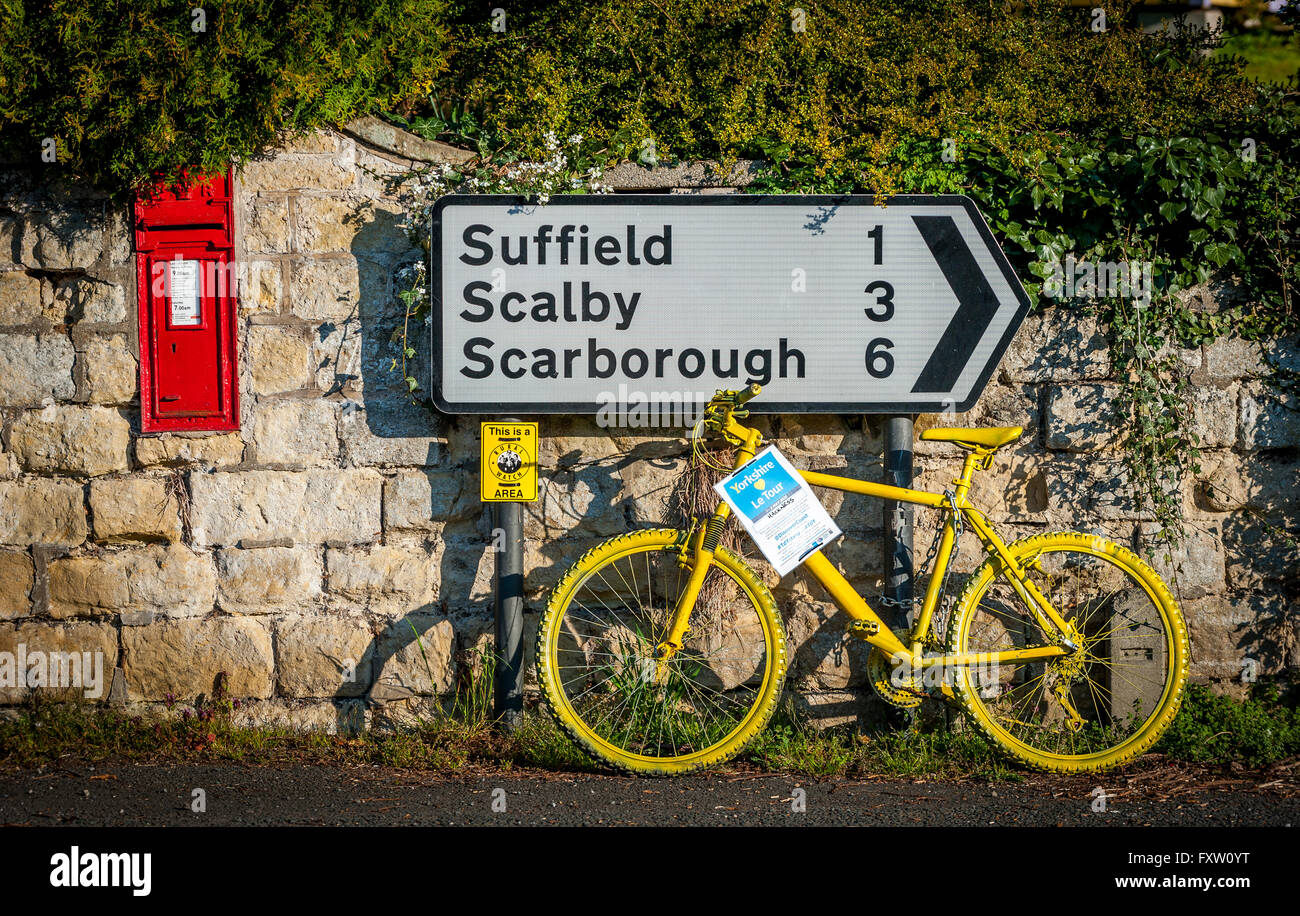 YELLOW PAINTED BIKE PROMOTING GRAND TOUR OF YORKSHIRE THE GRAND TOUR OF
