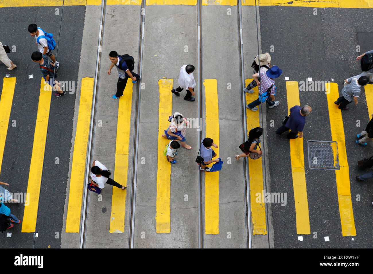 YELLOW PEDESTRIAN CROSSING CROSSING CENTRAL HONG KONG ASIA 02 May 2015 Stock Photo