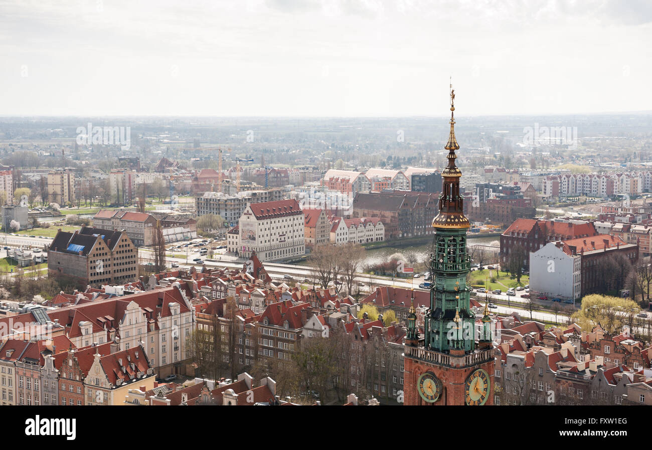 Main Town Hall tower in Gdansk, Polish Ratusz Miasta and cityscape top view from Kosciol Mariacki tower in Poland, Europe. Stock Photo