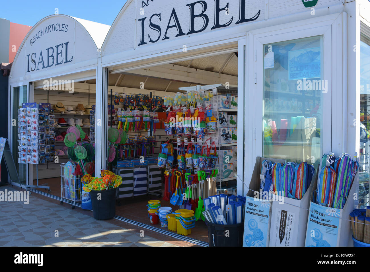 Isabel, a shop on the Arenal, selling buckets and spades etc for use on the  beach. Javea, Xabia, Alicante, Valencia, Spain Stock Photo - Alamy