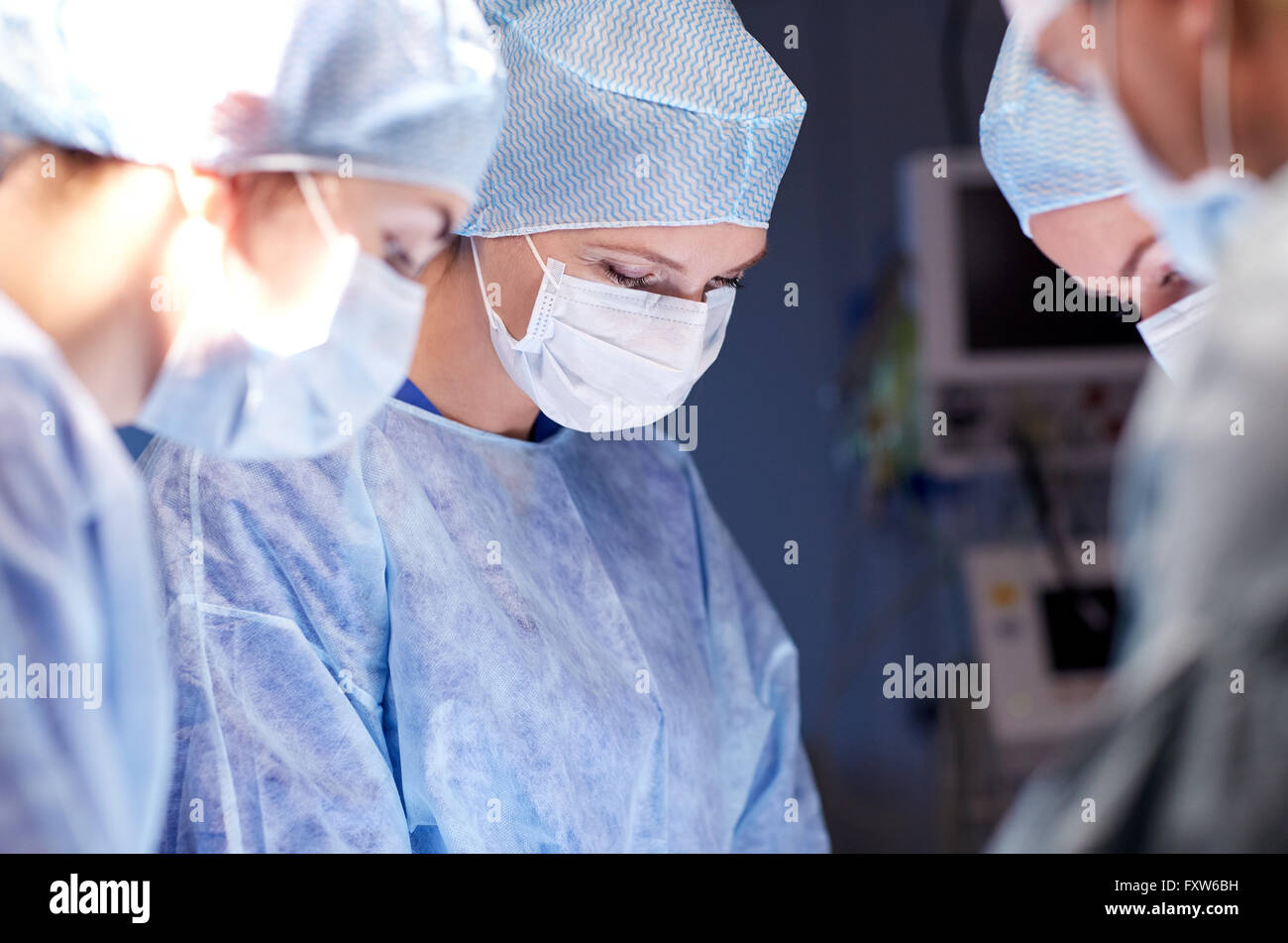 group of surgeons in operating room at hospital Stock Photo - Alamy
