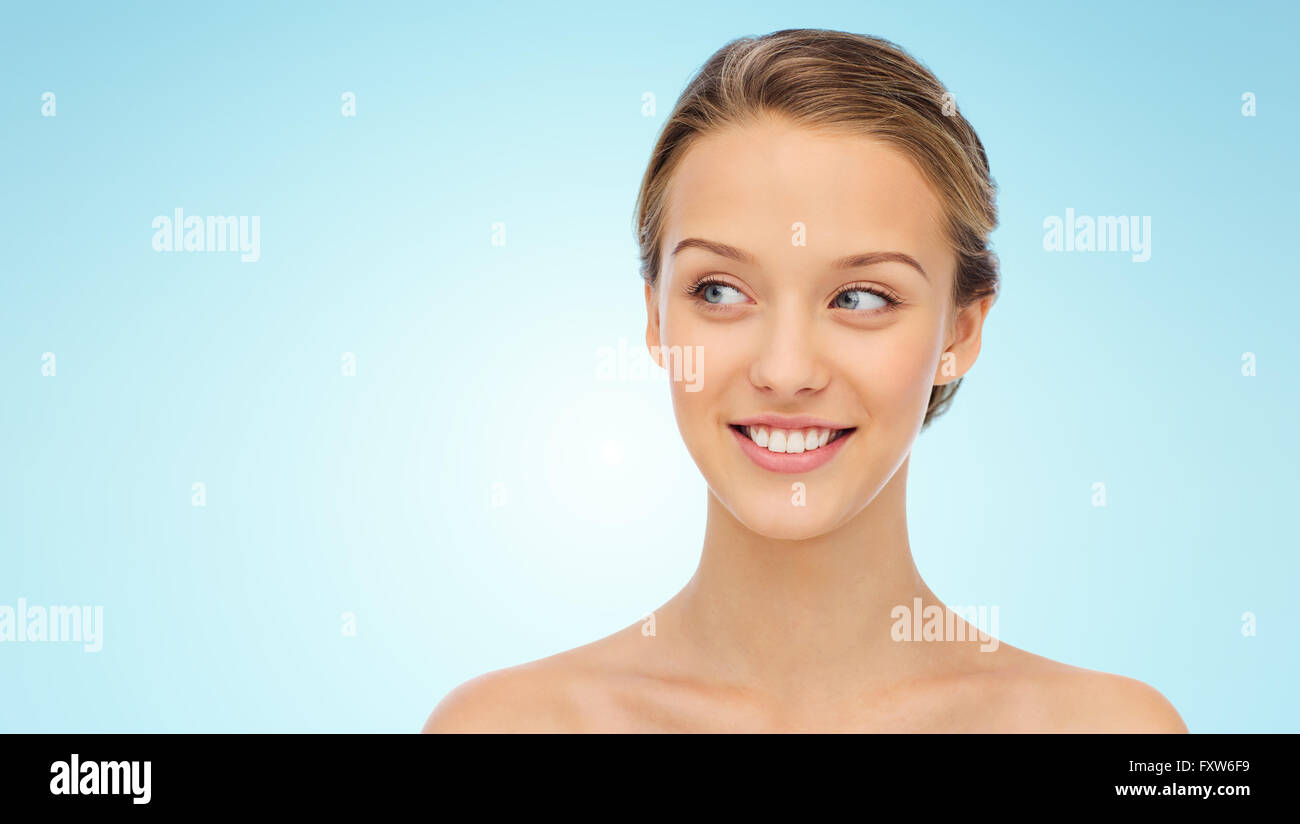 smiling young woman face and shoulders Stock Photo - Alamy