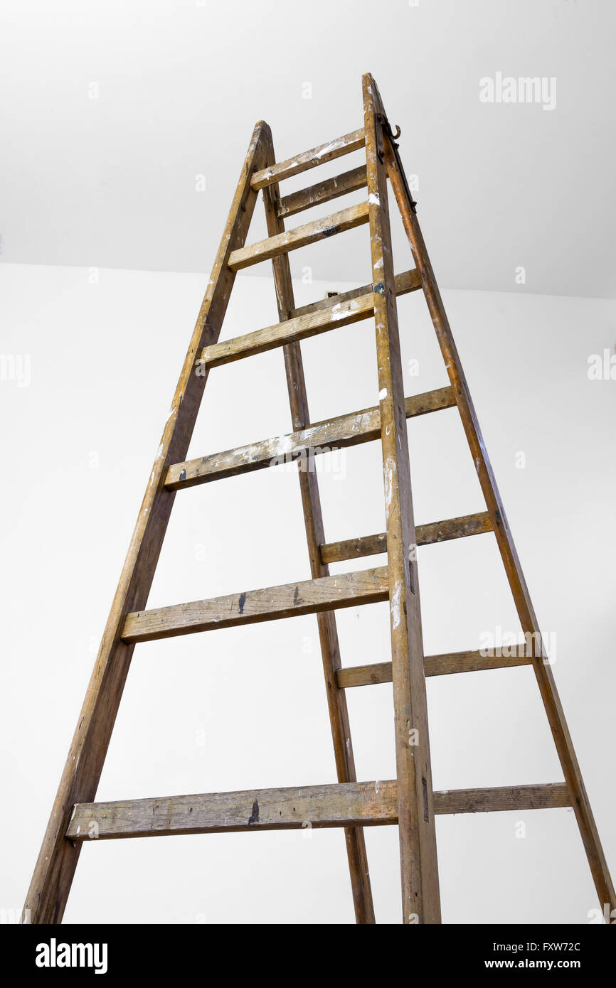Looking at the top of a ladder against the ceiling Stock Photo
