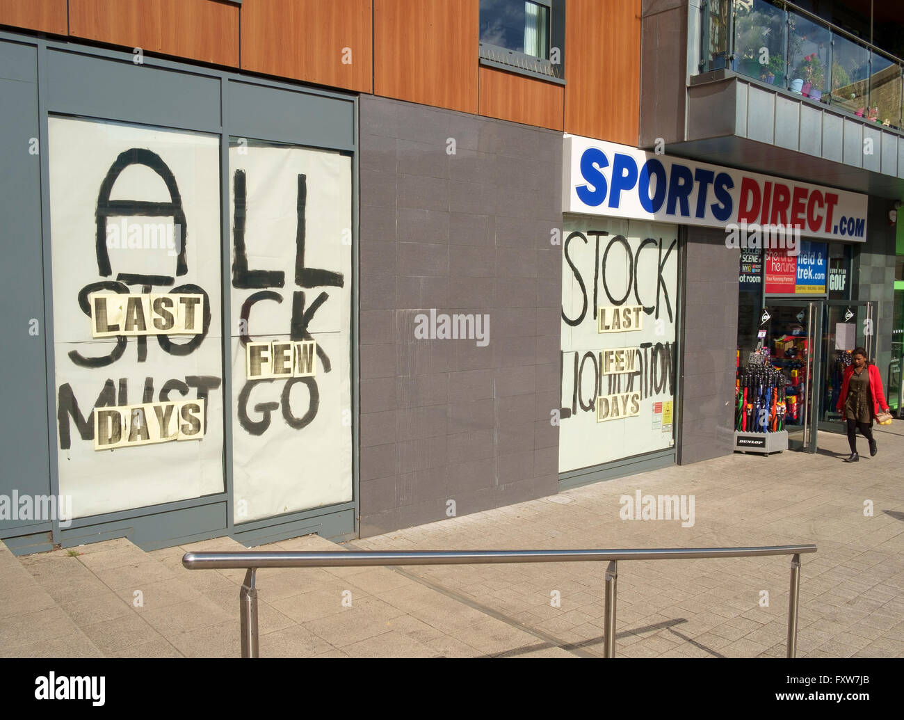 Sports Direct store in Redhill, Surrey with promotional posters giving impression of store closing Stock Photo