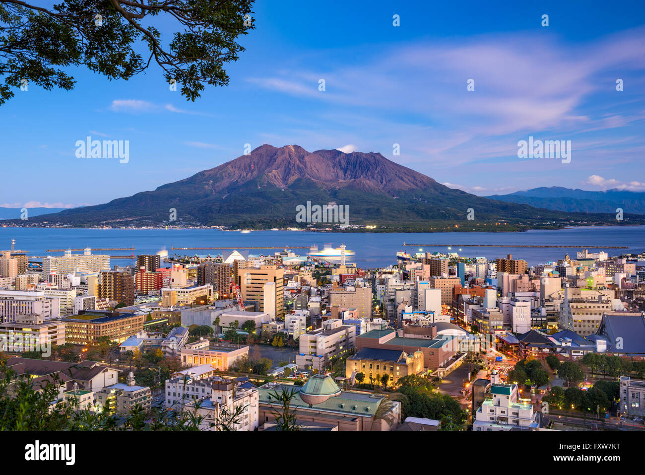 Kagoshima, Japan city skyline with Sakurajima Volcano. Stock Photo
