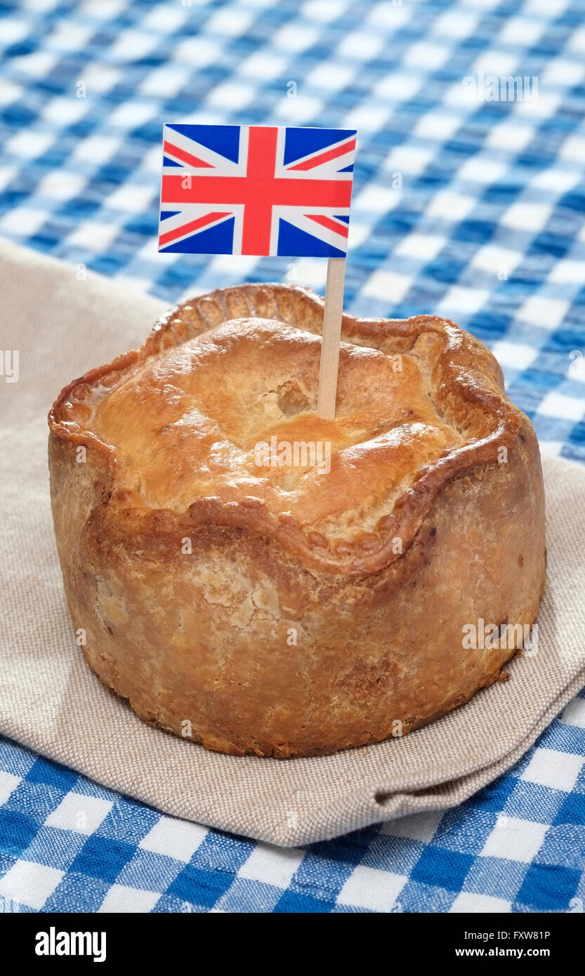 traditional british pork pie and union jack flag Stock Photo